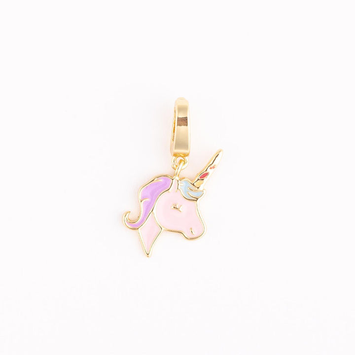 Enamel and gold-plated unicorn head charm centered on a white background featuring a lavender mane, light pink face, and a gold horn with blue and red accents
