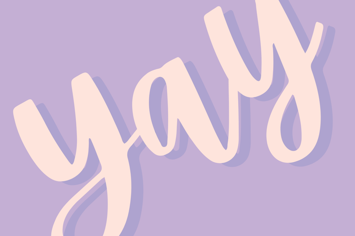 Digital graphic illustration featuring the word yay in a peach-colored cursive script set against a lavender purple background with a subtle drop shadow and a tilted composition