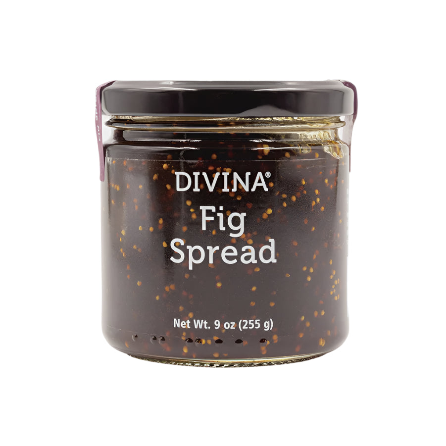 Studio photograph of a nine-ounce glass jar of Divina Fig Spread on a white background featuring dark brown jam filled with golden seeds and a glossy black lid