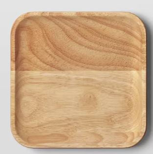 Wooden plate by an unknown maker featuring a square serving tray on a plain studio background showcasing a prominent horizontal grain split, honey-colored wood textures, and soft rounded corners