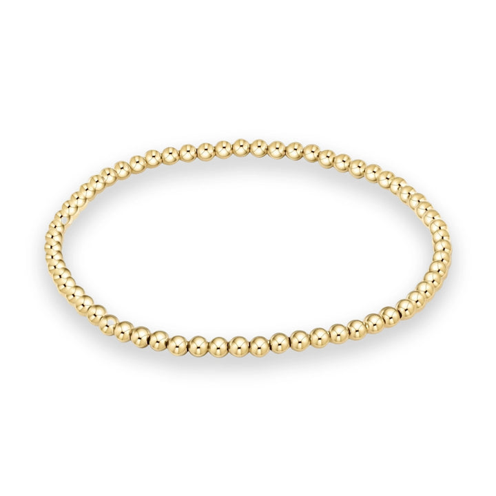 Gold-filled jewelry by an unknown designer portrays a spherical beaded bracelet on a white background with a high-shine polished finish and a soft underlying shadow