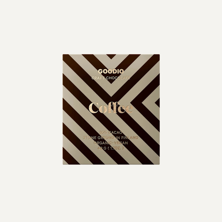 Graphic design packaging by Goodio features a Coffee flavored craft chocolate bar from Finland showcasing a bold brown and cream chevron pattern with rose gold foil typography and stone ground 56% cacao text