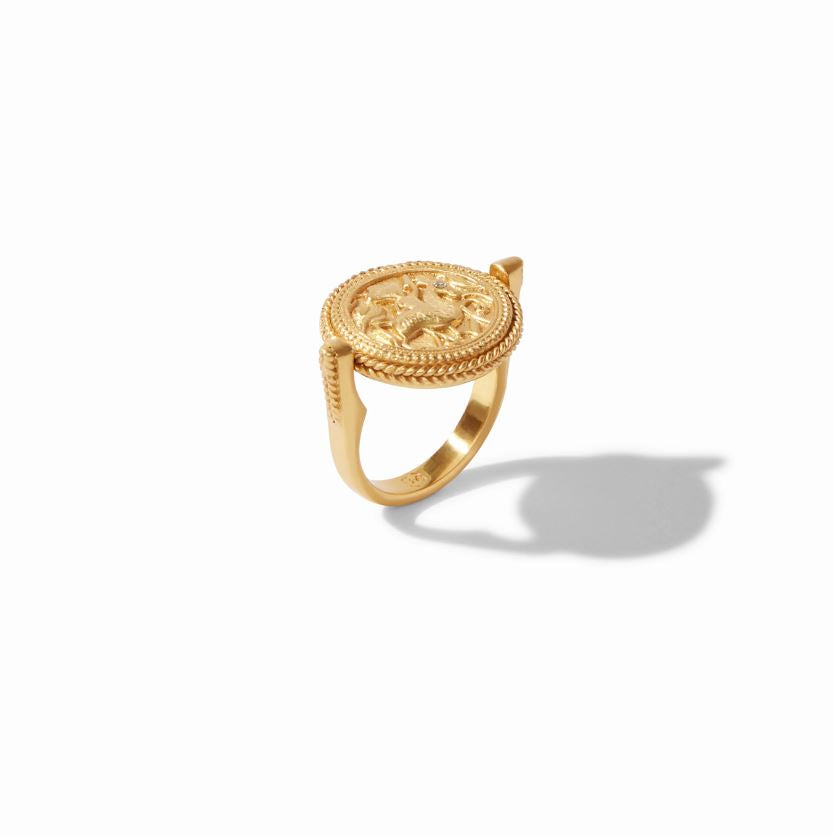 Julie Vos 24k gold plate flip ring showcasing a rotating medallion with an embossed Pegasus motif on a white studio background featuring a braided rope border and a tiny inset crystal