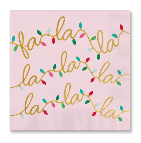 Graphic design on a light pink paper napkin featuring festive fa la la typography in gold glitter script adorned with a string of colorful Christmas light bulbs in red, teal, and magenta