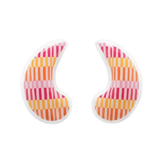 Product photography of a pair of reusable gel eye masks in a crescent shape featuring a vibrant pattern of pink, orange, and yellow vertical stripes on a clean white background