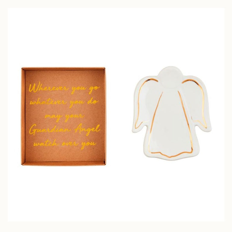 Ceramic gift set featuring a white guardian angel trinket token with metallic gold trim and a brown kraft paper box inscribed with a gold cursive blessing on a plain white background