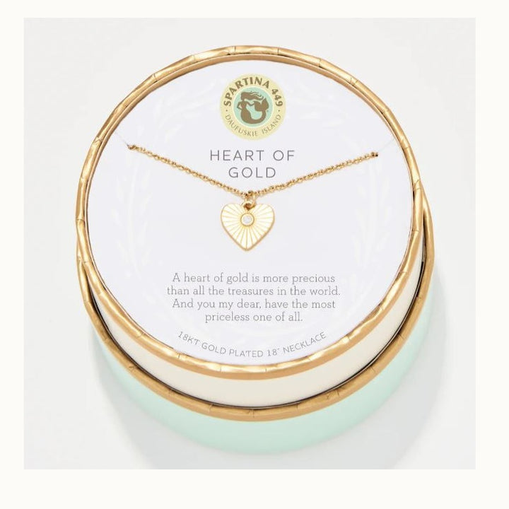 18kt gold plated necklace by Spartina 449 featuring a sunburst-engraved heart pendant with a crystal center presented in its circular Daufuskie Island gift box with gold trim