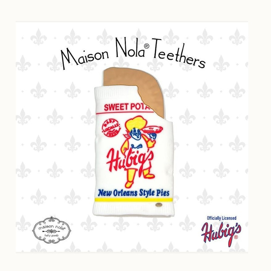 Silicone baby teether by Maison Nola featuring the iconic New Orleans Hubig's Sweet Potato Pie design with the Savvy Simon mascot and a tan pie crust detail against a white background with grey fleur de lis patterns