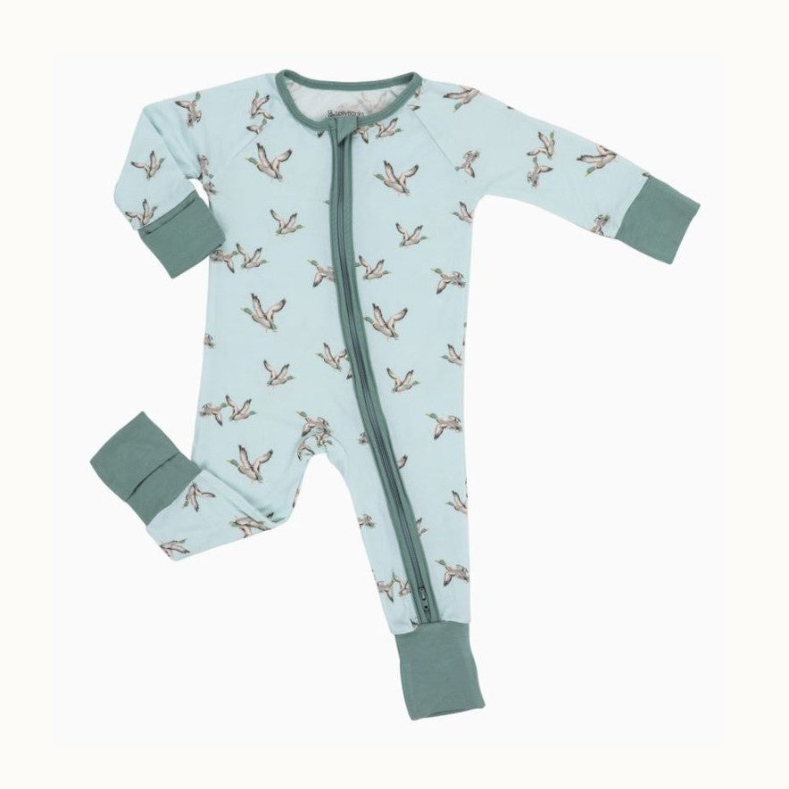 Little Sleepies bamboo viscose baby pajama featuring a repeating flying mallard duck pattern on a light blue background with sage green ribbed fold-over cuffs and a double-ended zipper against a white backdrop