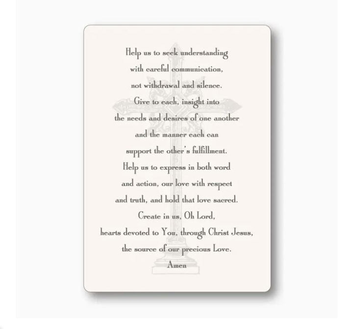 Decorative religious prayer card featuring a Christian prayer for communication and love in black serif typography centered over a faint ornate cross watermark on a cream-colored background with rounded corners and a soft drop shadow