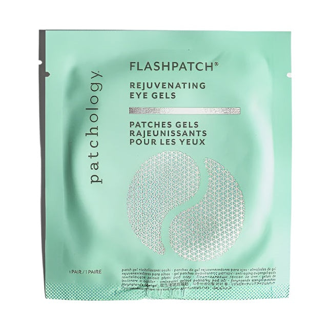 Commercial product photograph of a Patchology FlashPatch Rejuvenating Eye Gels sachet featuring a mint green background, silver foil accents, and two white honeycomb-patterned crescent graphics arranged in a central circle