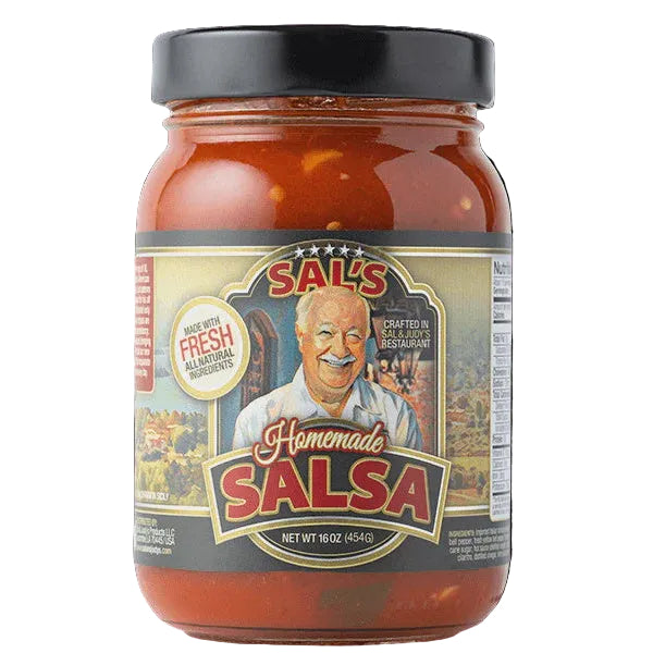 Product photograph of Sal's Homemade Salsa featuring a glass jar against a white background with a label depicting a smiling man with a white mustache and the coastal landscape of Cefalù Sicily with a black lid and vibrant red chunky sauce
