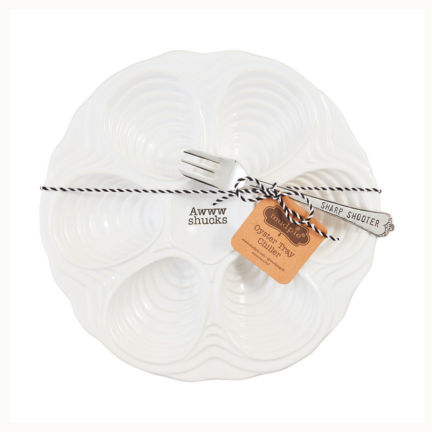 Ceramic oyster tray by Mud Pie features a white scalloped platter with six shell-shaped wells centered on a white background, including the text Awww shucks and a silver fork engraved with SHARP SHOOTER tied with black and white baker&