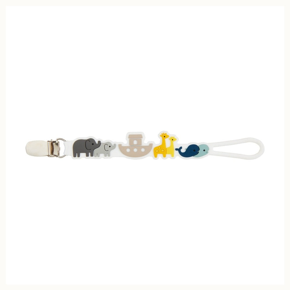 Silicone pacifier clip depicting the iconic Noah’s Ark theme on a white background featuring a central beige ark alongside pairs of gray elephants, yellow giraffes, and blue whales